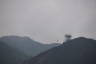 Photo ID: 063917, Cabins strung out against the sky and mountains (72Kb)
